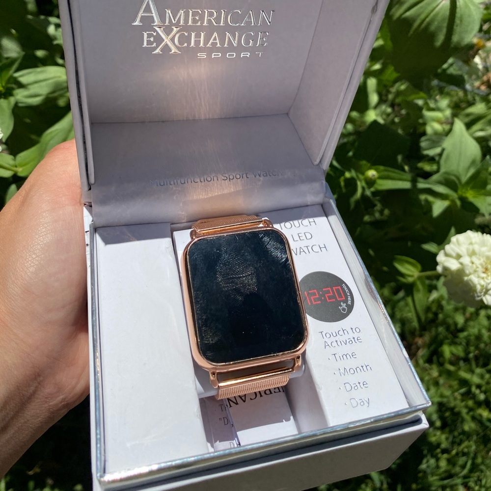 American Exchange rose gold sport watch.